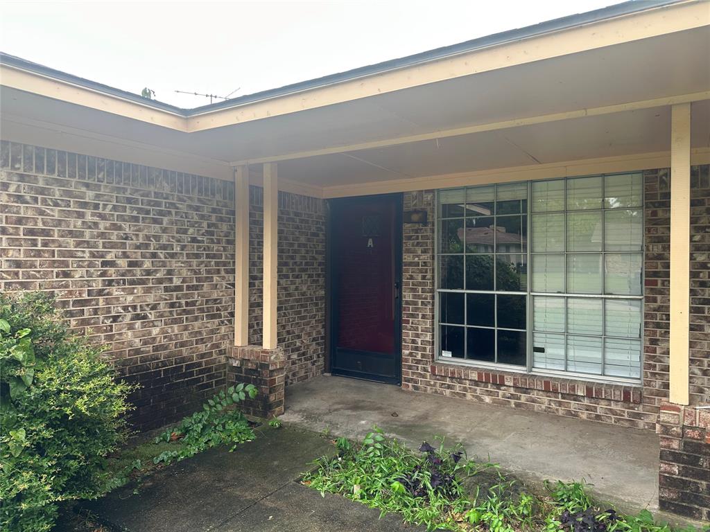2109 Quail Run, Unit A McKinney, TX 75071 - Photo 2 of 16 a view of front door