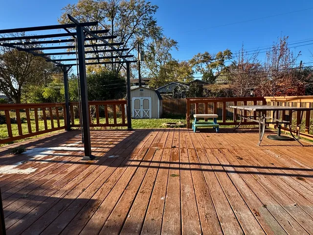 a view of a swimming pool with a patio