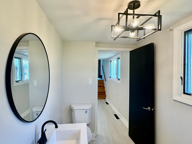 a close view of light fixtures and entryway