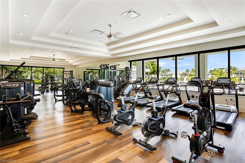 275 Indies Way, Unit 902 Naples, FL 34110 - Photo 31 of 39 a view of a room with gym equipment