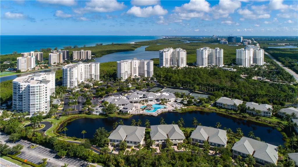 275 Indies Way, Unit 902 Naples, FL 34110 - Photo 39 of 39 a front view of a house with a yard