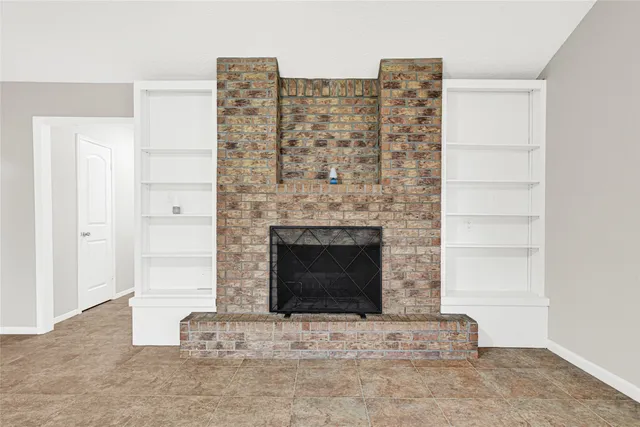 a view of fireplace and entryway