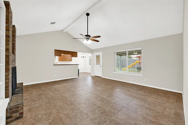 a view of empty room with windows