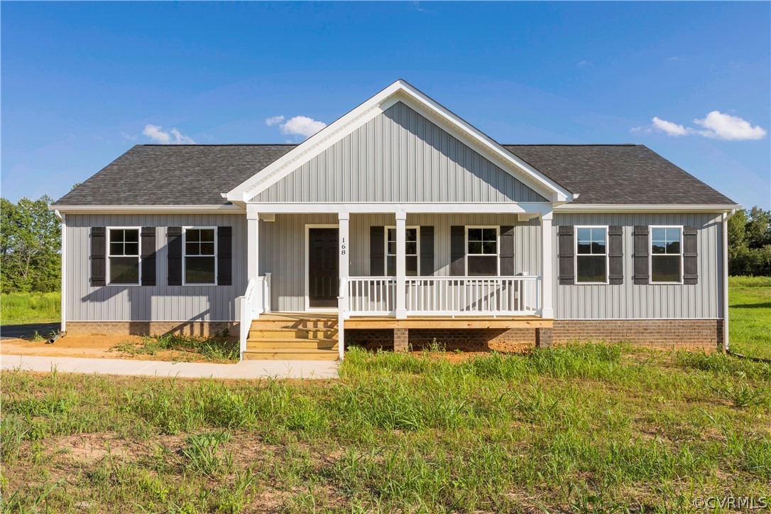 5 Cross County Road Mineral, VA 23117 - Photo 1 of 20 a front view of a house with a garden and yard