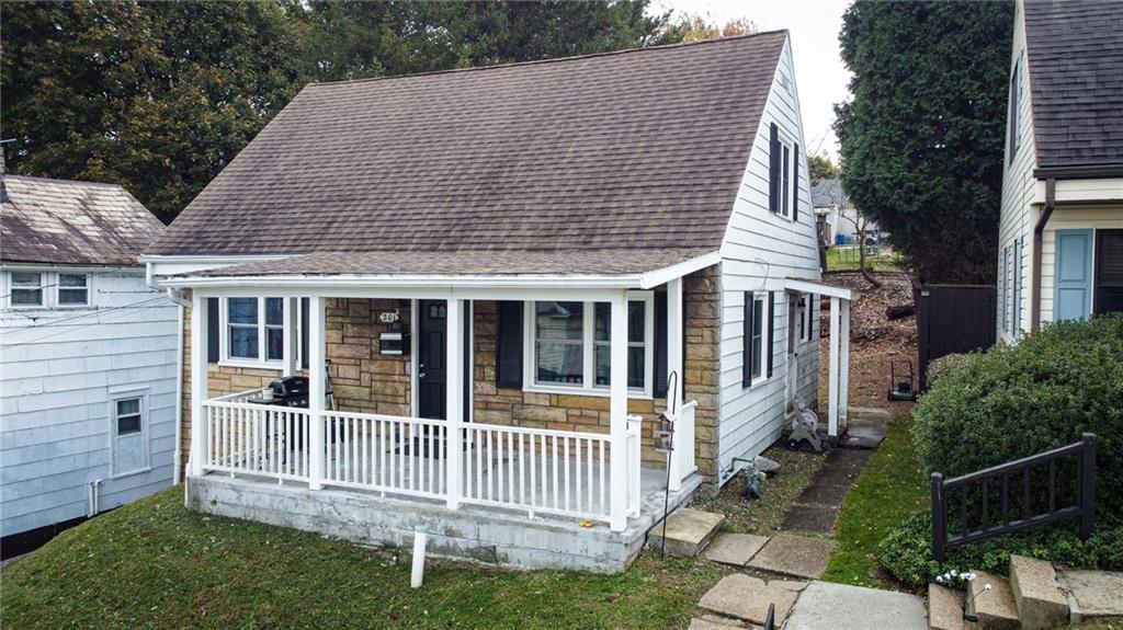 a house view with a garden space
