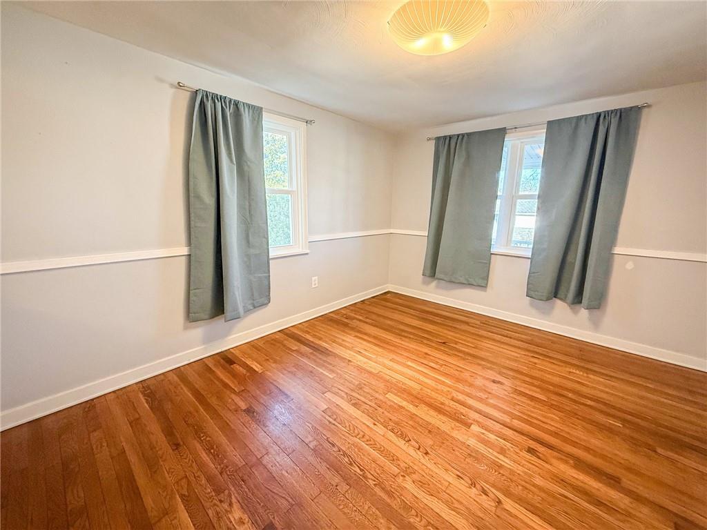 201 Wallula Avenue Butler, PA 16001 - Photo 13 of 41 wooden floor in an empty room with a window