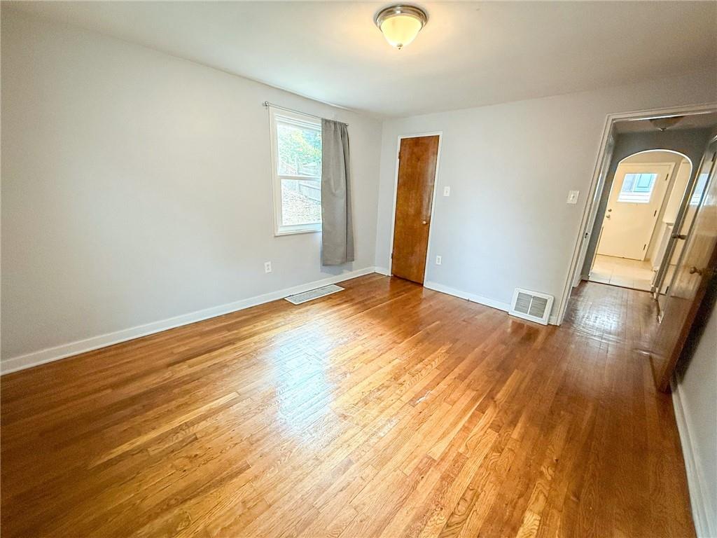 201 Wallula Avenue Butler, PA 16001 - Photo 20 of 41 a view of empty room with wooden floor and fan