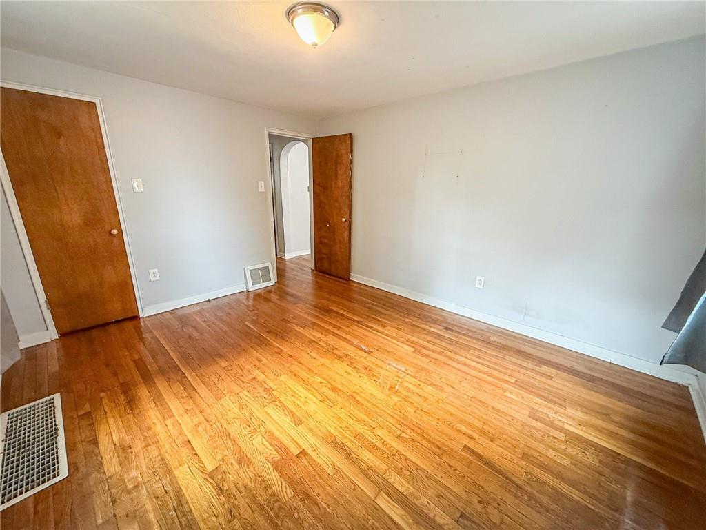 201 Wallula Avenue Butler, PA 16001 - Photo 21 of 41 a view of empty room with wooden floor