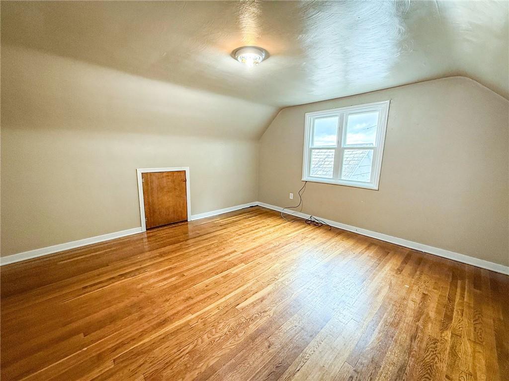 201 Wallula Avenue Butler, PA 16001 - Photo 23 of 41 an empty room with wooden floor and windows