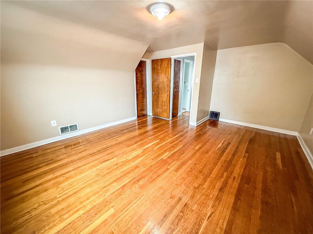201 Wallula Avenue Butler, PA 16001 - Photo 25 of 41 a view of an empty room with wooden floor
