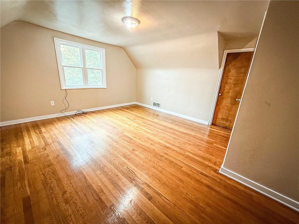 201 Wallula Avenue Butler, PA 16001 - Photo 26 of 41 an empty room with wooden floor and windows