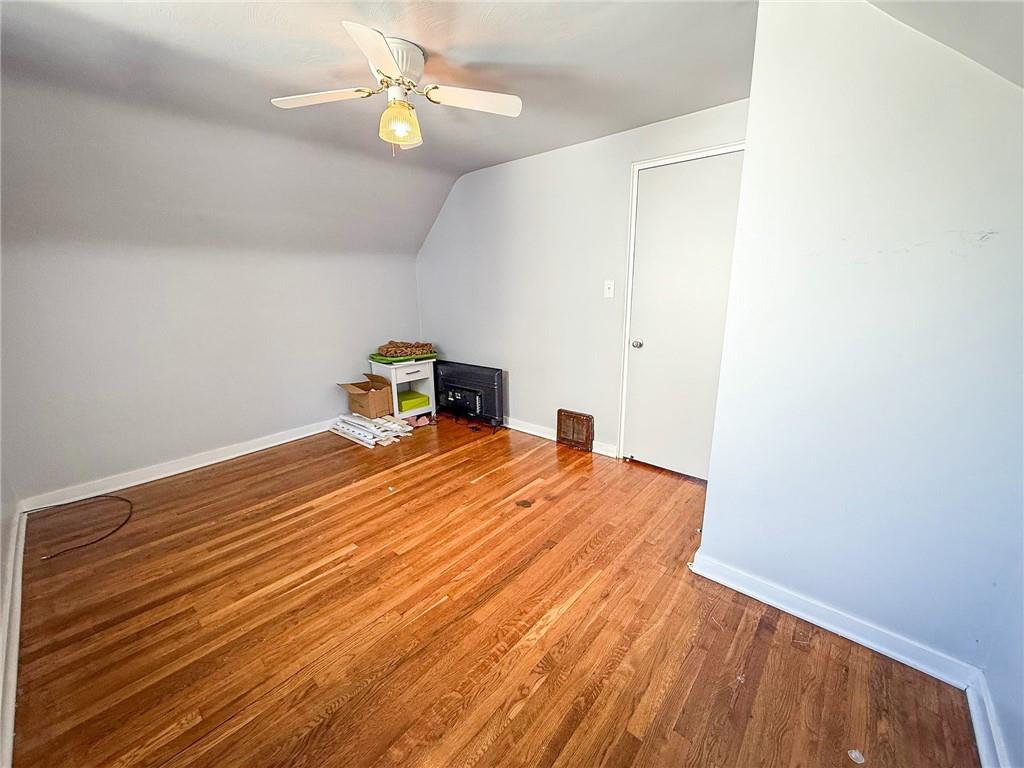 201 Wallula Avenue Butler, PA 16001 - Photo 30 of 41 a bedroom with a bed and a chandelier