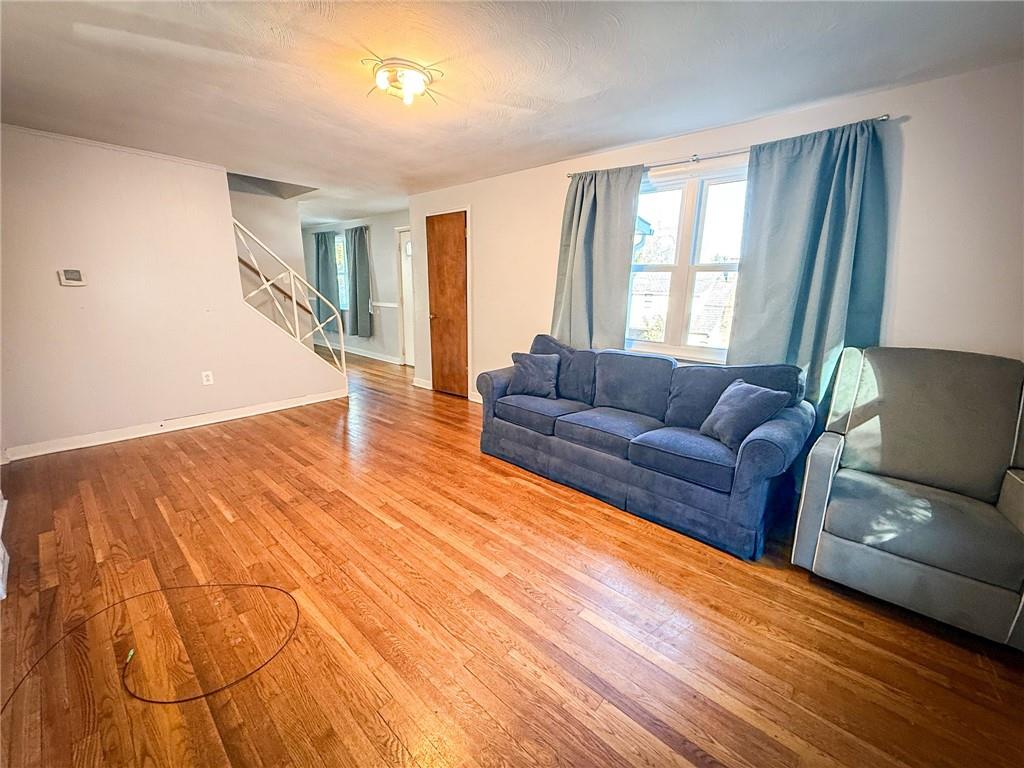 201 Wallula Avenue Butler, PA 16001 - Photo 3 of 41 a living room with furniture and a large window