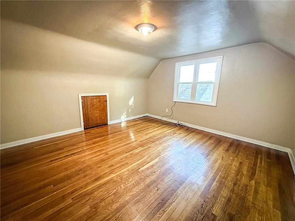 201 Wallula Avenue Butler, PA 16001 - Photo 32 of 41 an empty room with wooden floor and windows