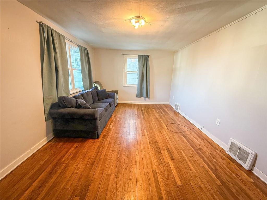 201 Wallula Avenue Butler, PA 16001 - Photo 4 of 41 a living room with furniture and a wooden floor