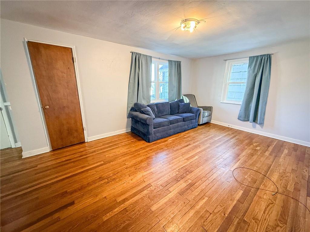 201 Wallula Avenue Butler, PA 16001 - Photo 5 of 41 a living room with a bed and a window
