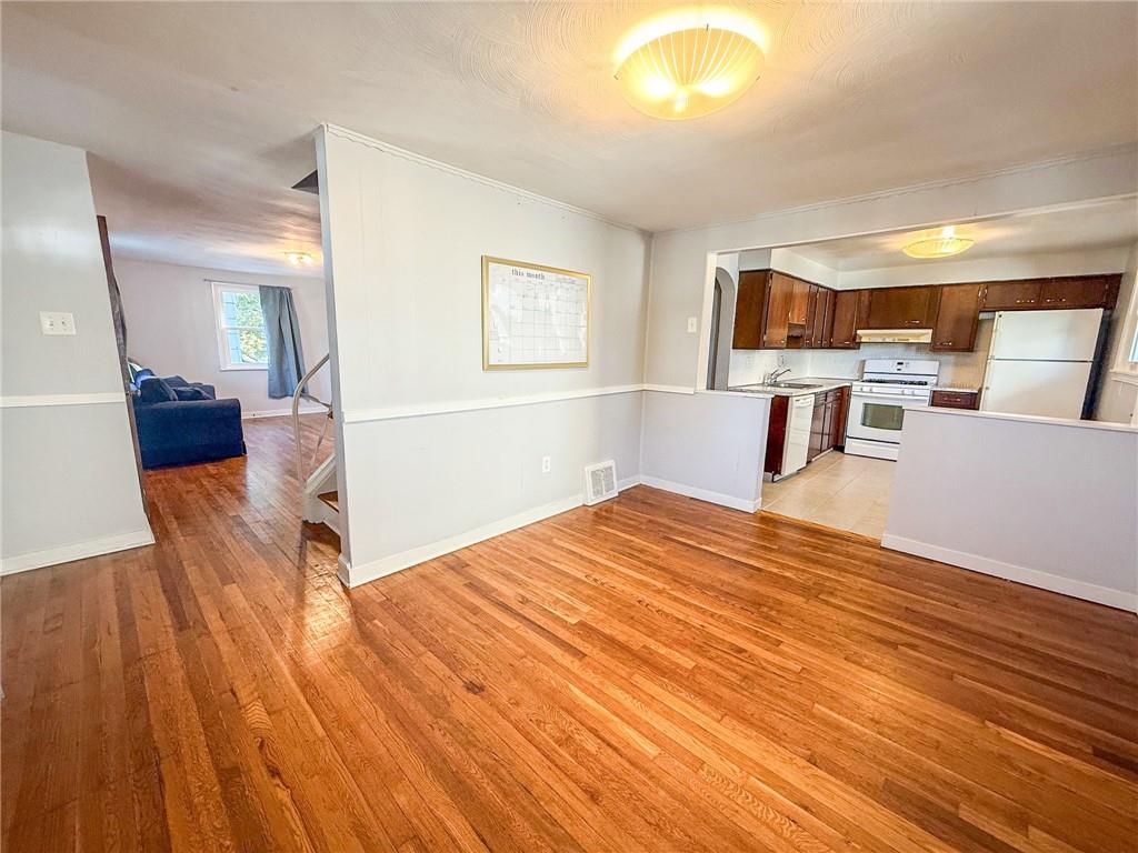 201 Wallula Avenue Butler, PA 16001 - Photo 10 of 41 a bedroom with a bed and wooden floor