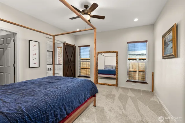 a bedroom with a bed and closet