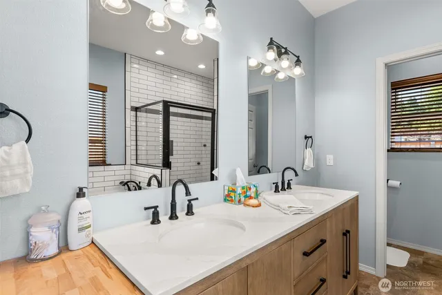a bathroom with a bathtub and a sink