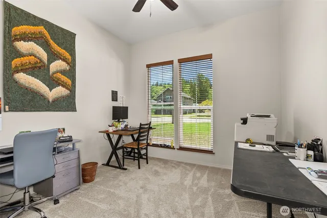 a utility room with sink dryer and washer