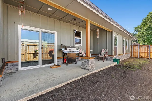 a view of a building with sitting area