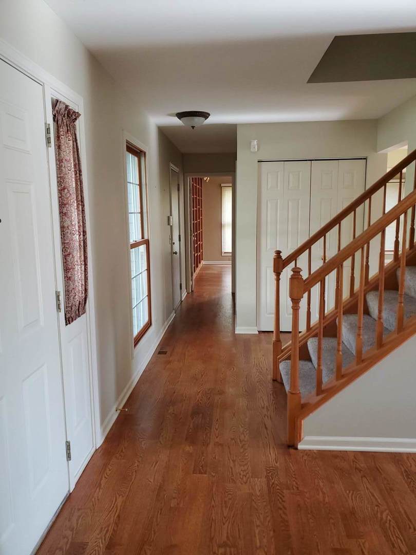 950 Ripple Brook Lane Elgin, IL 60120 - Photo 5 of 38 a view of an entryway with wooden floor