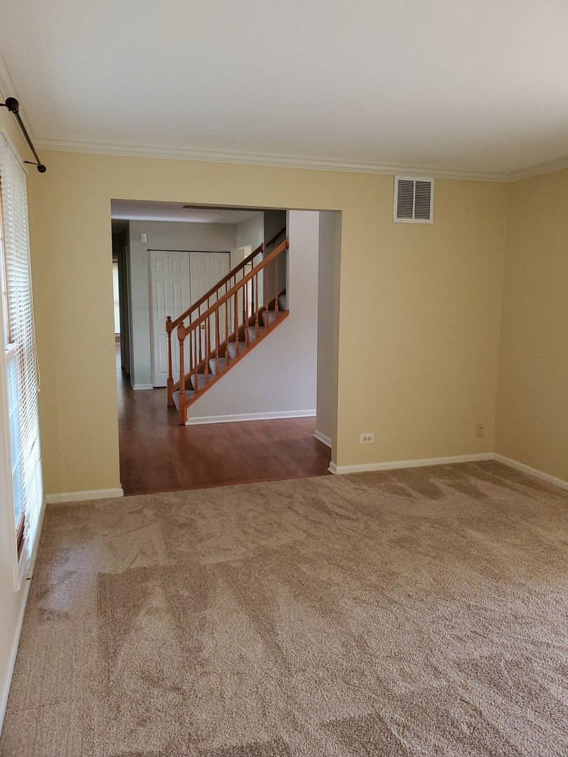 950 Ripple Brook Lane Elgin, IL 60120 - Photo 7 of 38 a view of an entryway with staircase