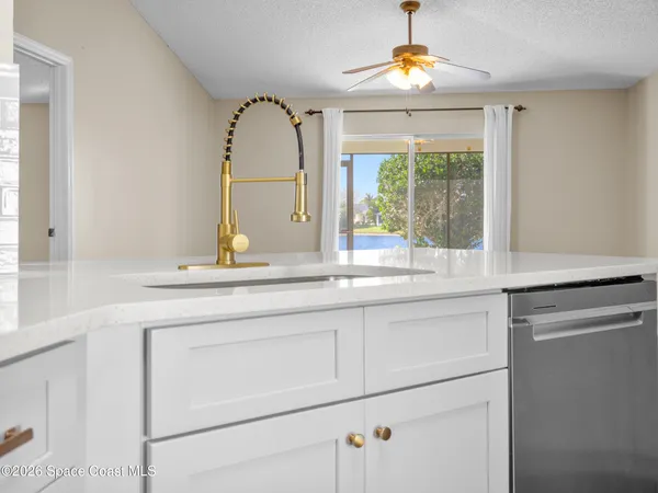 a bathroom with a sink and a window