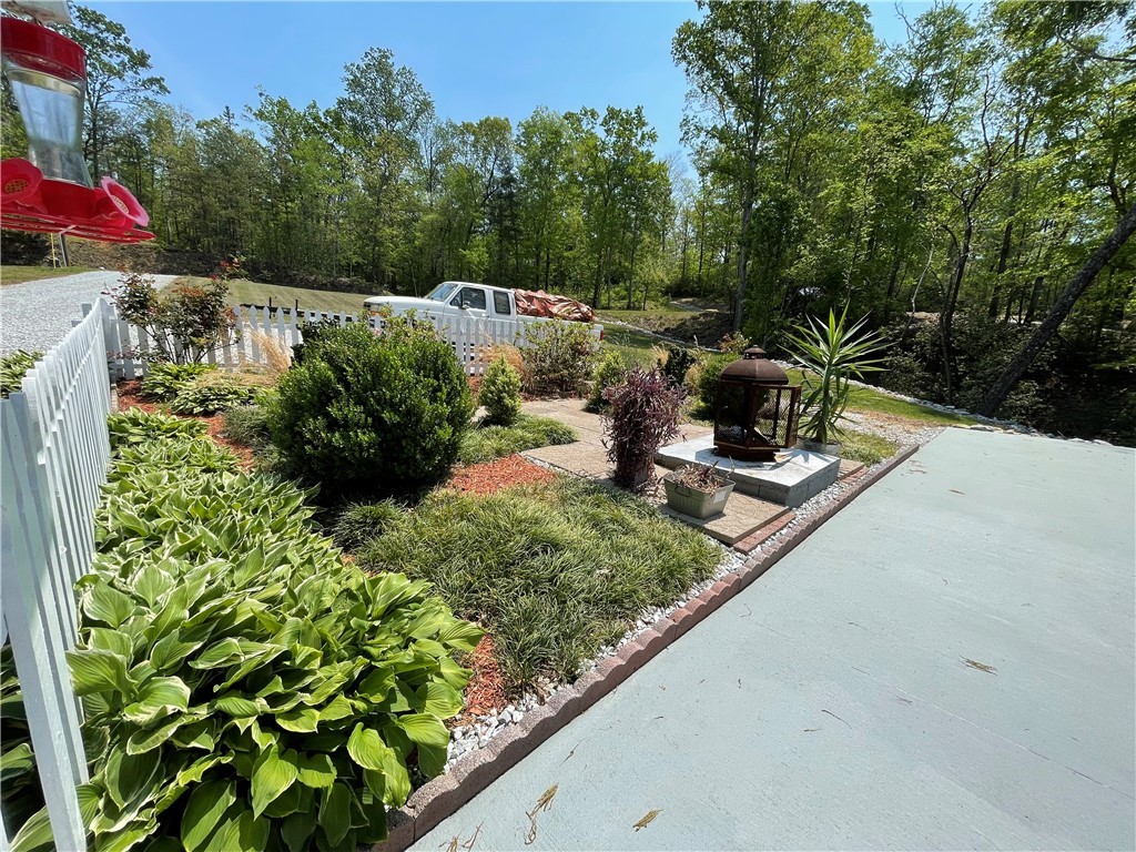 649 State Rd S-37-577 Salem, SC 29676 - Photo 6 of 50 Gravel drive, garden and fire pit by the Patio Are