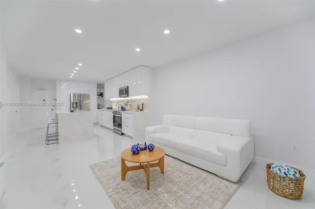 a living room with furniture and a table
