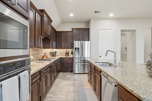 $530,000 | 127 Deerchase Drive, Conroe, TX 77384