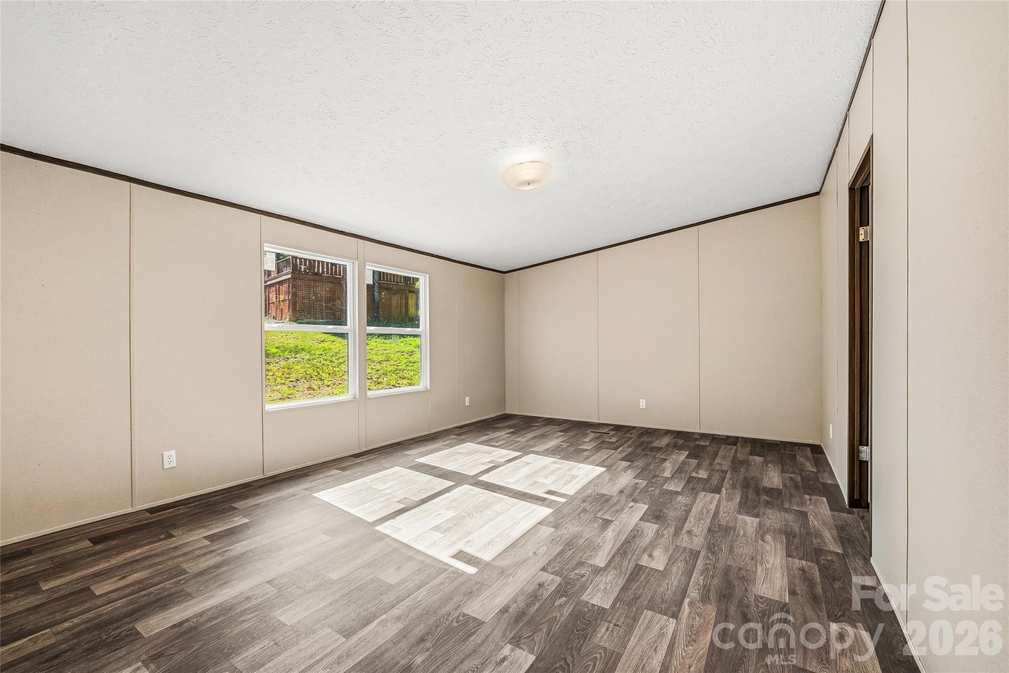45 Alan Retreat Road Hendersonville, NC 28792 - Photo 17 of 25 a view of an empty room with a window