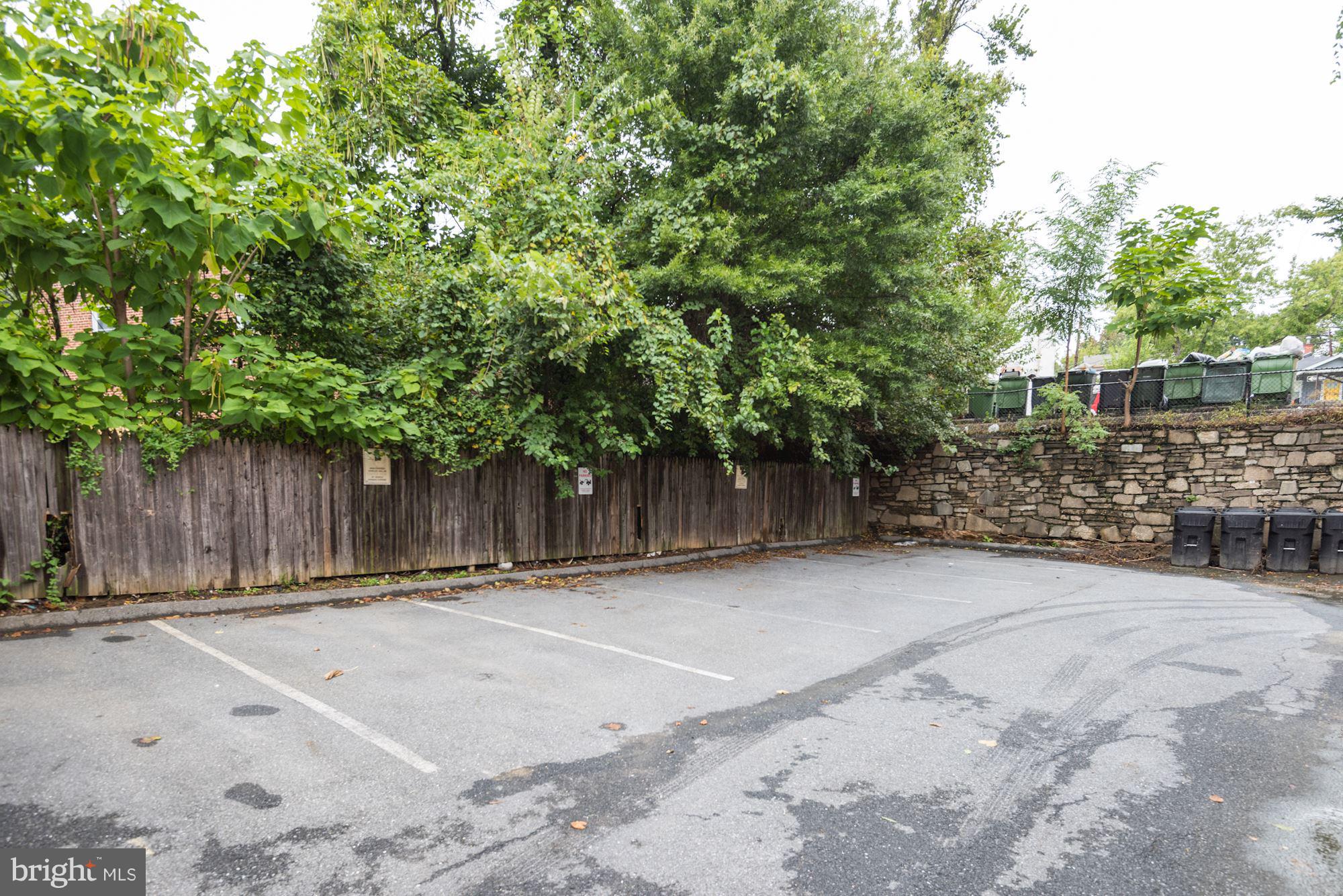 4210 Benning Road Northeast, Unit 4 Washington, DC 20019 - Photo 11 of 11 Parking area to the left of the entrance gate