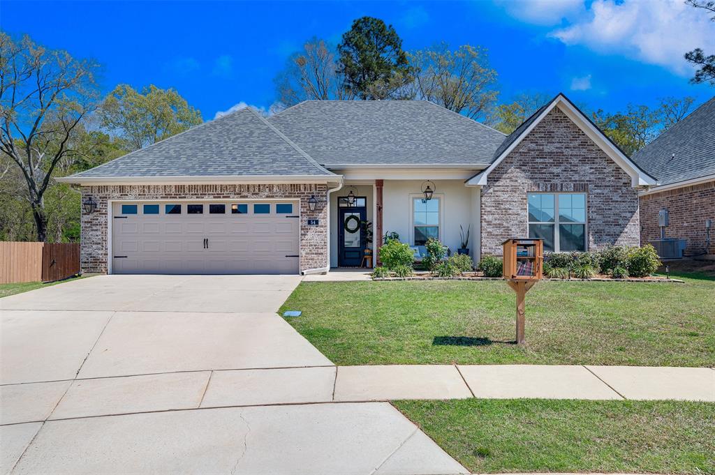 54 Crowder Drive Benton, LA 71006 - Photo 1 of 1 a front view of a house with a yard