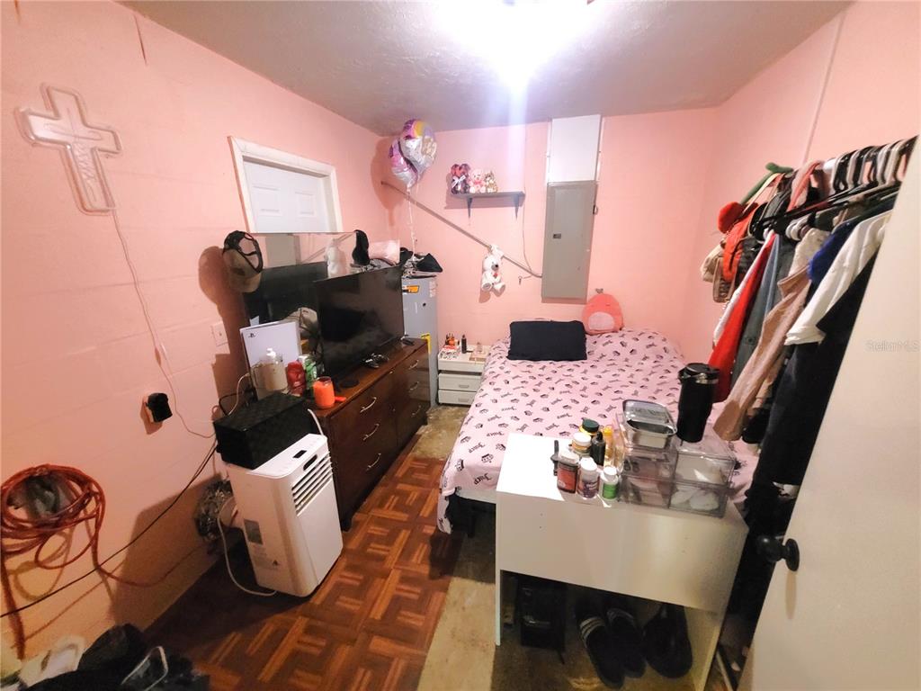 5203 Presidential Street Seffner, FL 33584 - Photo 21 of 21 a living room with furniture and a flat screen tv