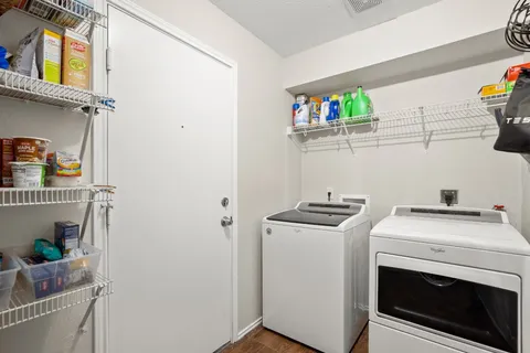 a view of a room with a window and a storage