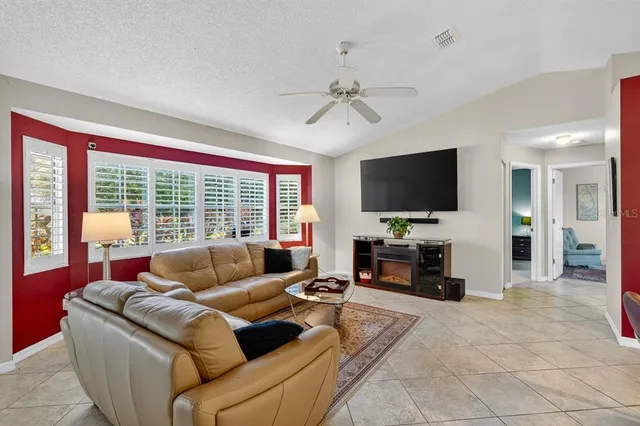 a kitchen with a stove a sink and a refrigerator