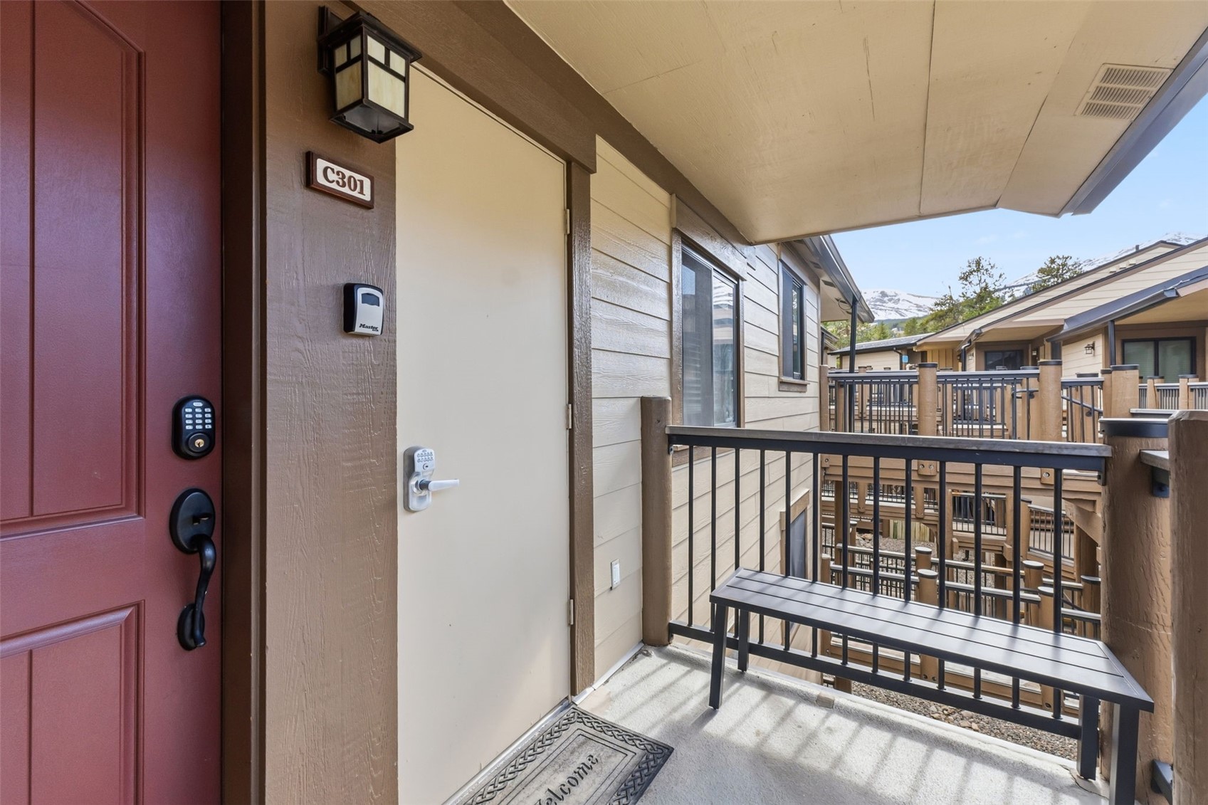 325 Four Oclock Road, Unit C301 Breckenridge, CO 80424 - Photo 19 of 26 a view of balcony with wooden floor