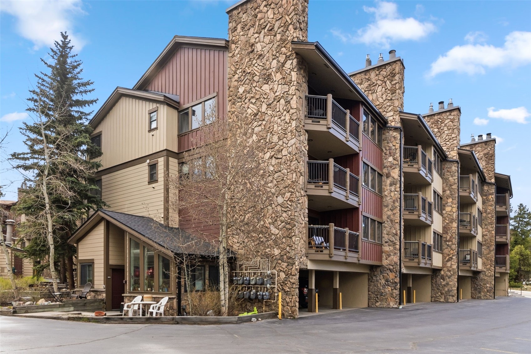 325 Four Oclock Road, Unit C301 Breckenridge, CO 80424 - Photo 26 of 26 a view of a brick building next to a road