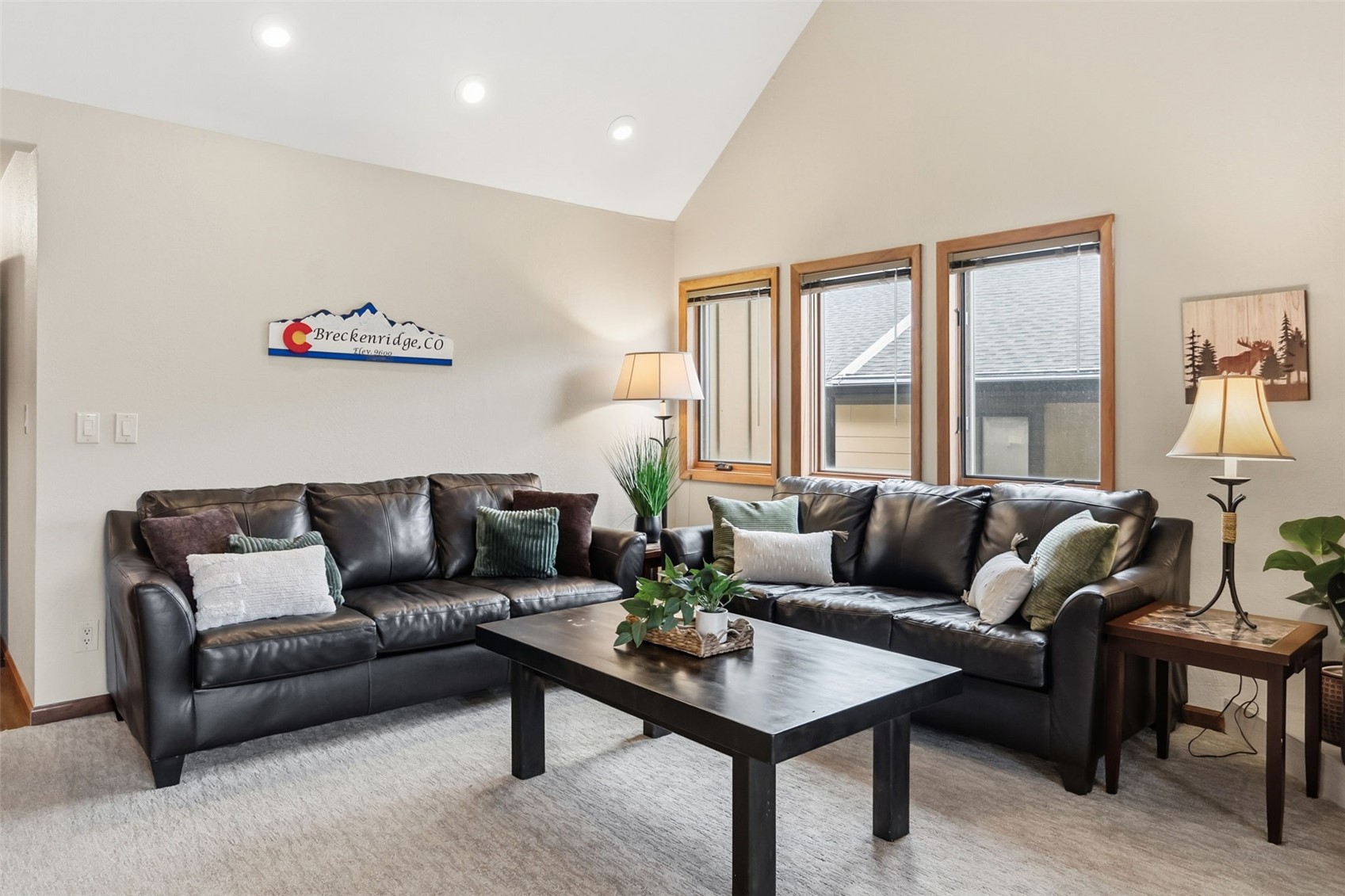 325 Four Oclock Road, Unit C301 Breckenridge, CO 80424 - Photo 5 of 26 a living room with furniture and a large window