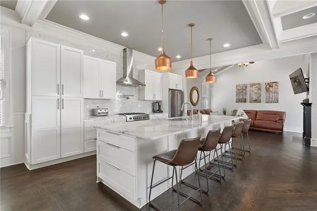 a kitchen with cabinets a sink and appliances