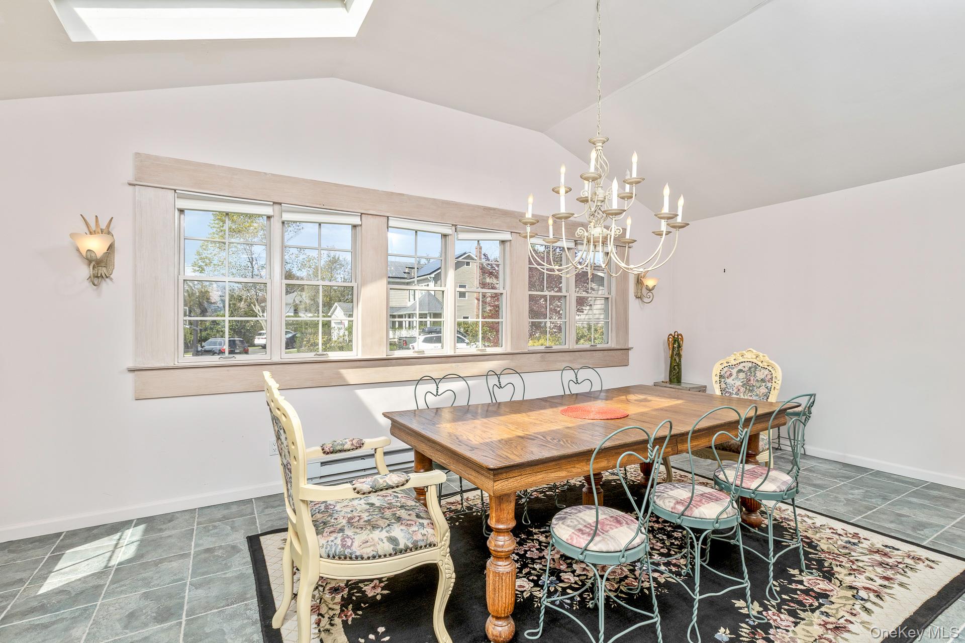 10 Fortune Court Commack, NY 11725 - Photo 11 of 34 Abundance of light in this welcoming formal dining room.