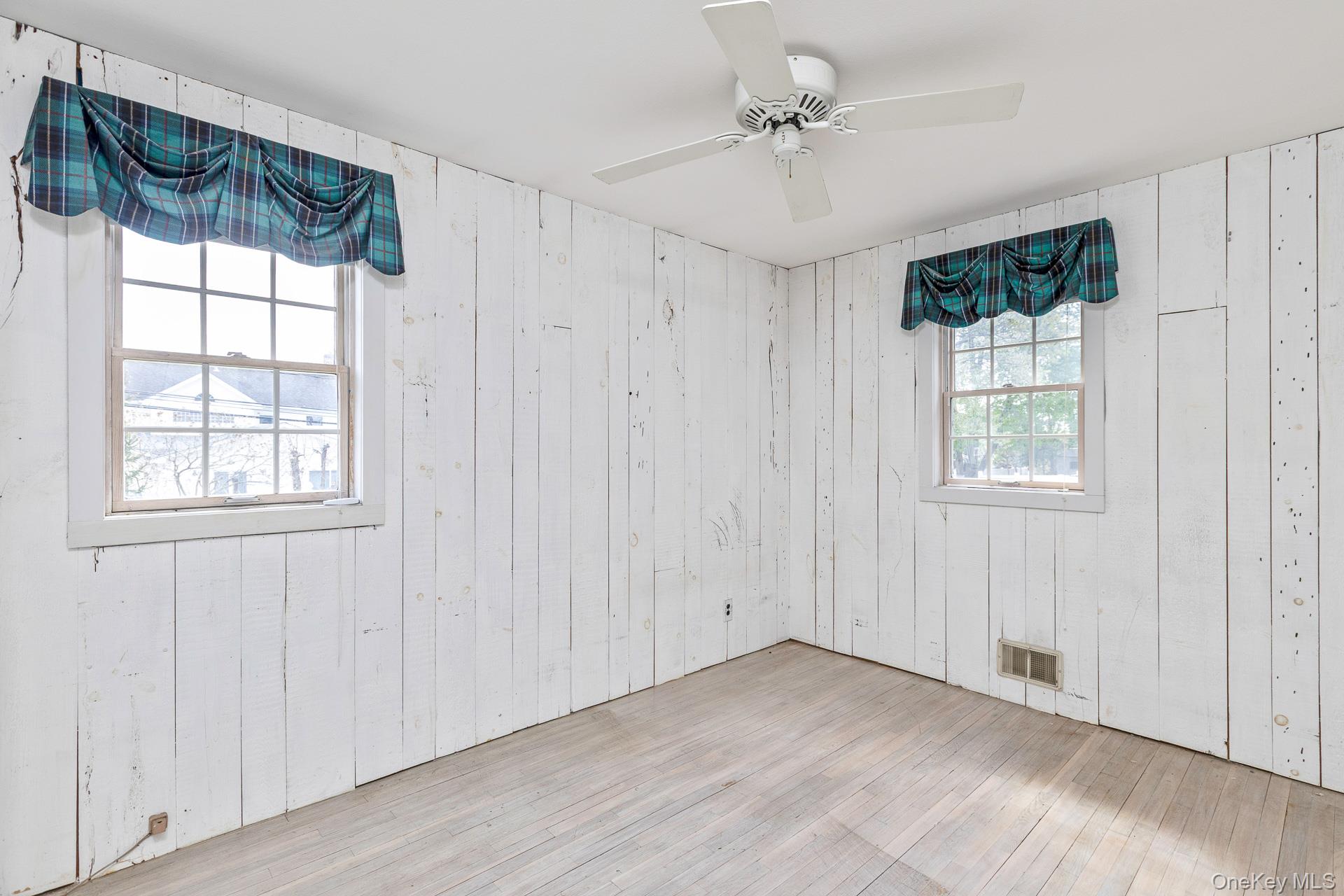10 Fortune Court Commack, NY 11725 - Photo 21 of 34 Bedroom with closet, whitewashed knotty pine walls