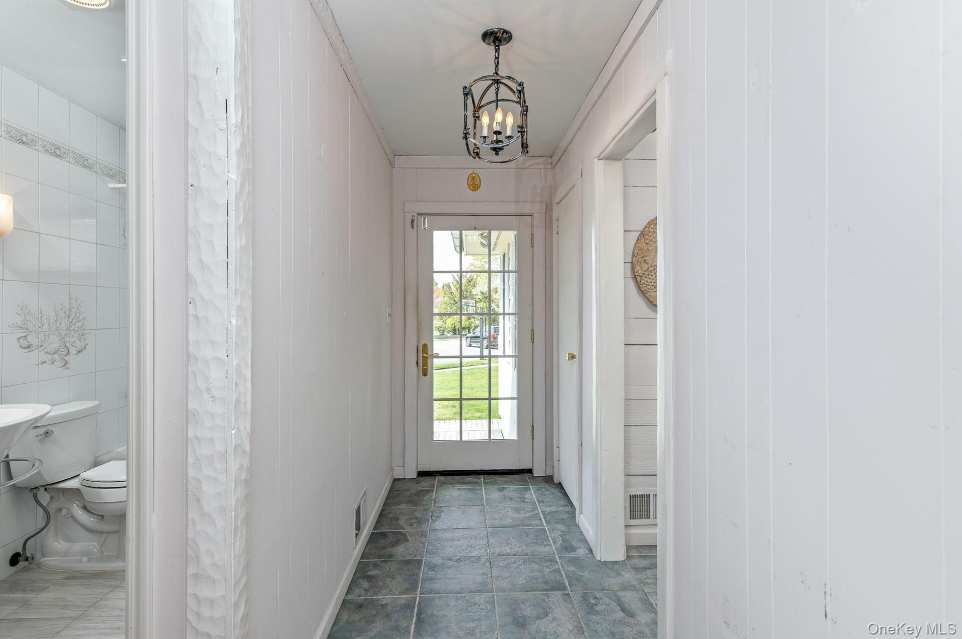 10 Fortune Court Commack, NY 11725 - Photo 6 of 34 Inviting glass entry foyer door.