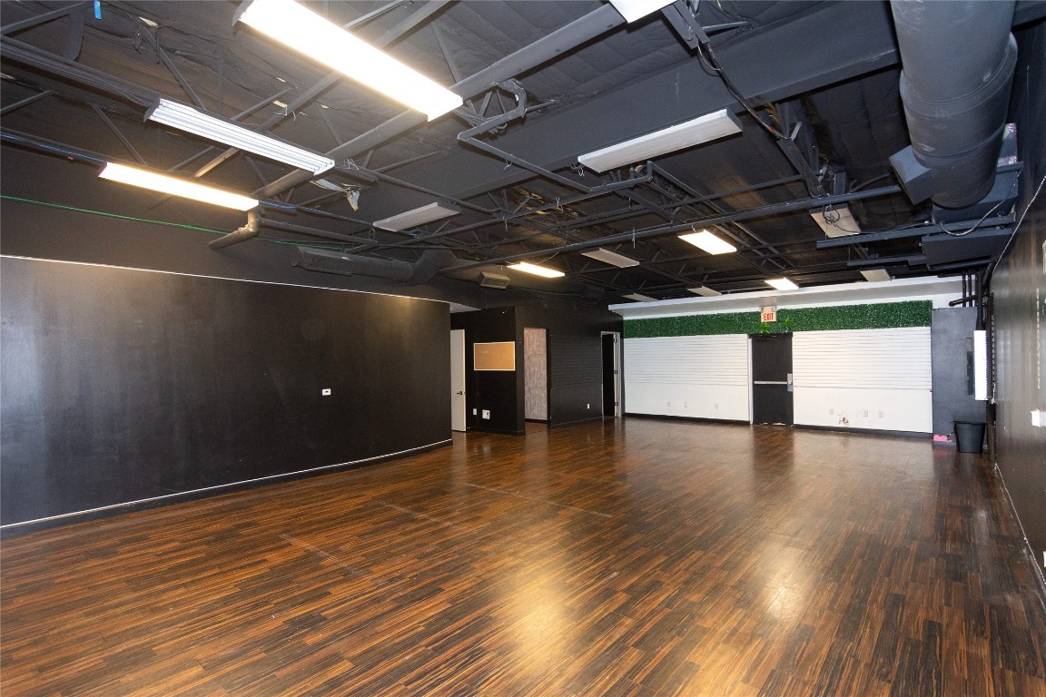 3808 Spicewood Springs Road Austin, TX 78759 - Photo 13 of 24 a view of empty room with wooden floor