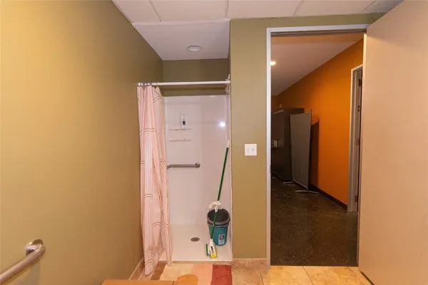 a bathroom with a mirror