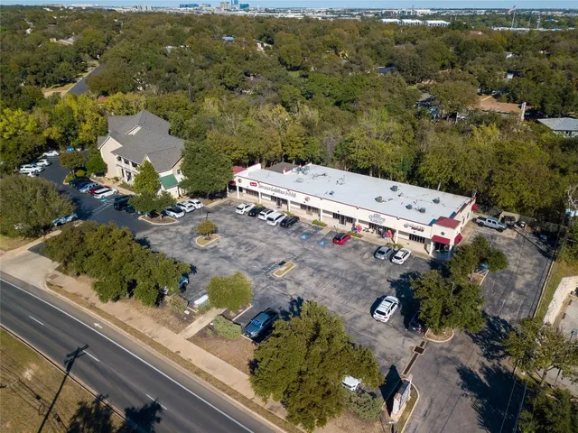 an aerial view of a city with lots of residential buildings