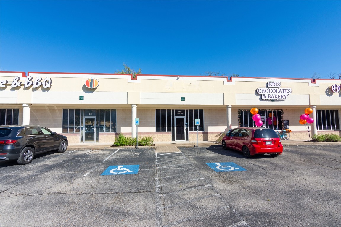 3808 Spicewood Springs Road Austin, TX 78759 - Photo 8 of 24 a car parked in front of a building