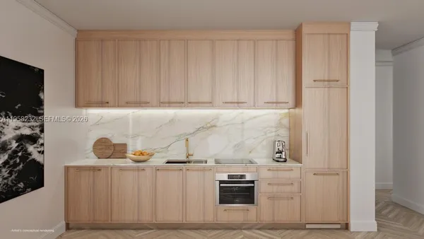 a view of kitchen with stainless steel appliances granite countertop cabinets and a stove top oven