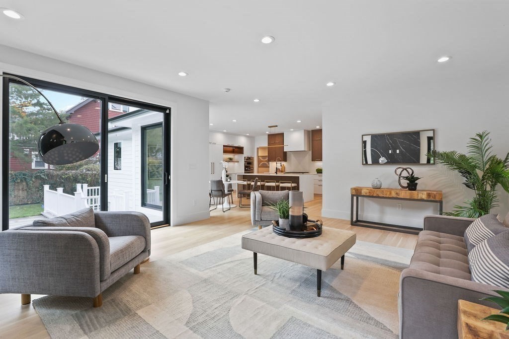 108 Bradford Street Needham, MA 02492 - Photo 14 of 42 a living room with furniture and a table
